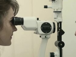 Senior man has his eyesight examined Stock Footage