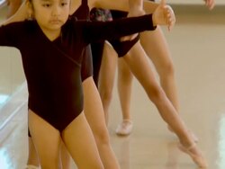 CU, TU, Four girls (6-7, 8-9) practicing ballet at bar in ballet class, Richmond, Virginia, USA Stock Footage