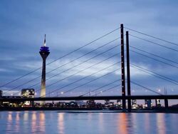 WS T/L View of Rheinturm (TV Tower), RheinkniebrÃƒÂ¼cke and Rhine River at dusk / DÃƒÂ¼sseldorf, North Rhine-Westphalia, Germany Stock Footage