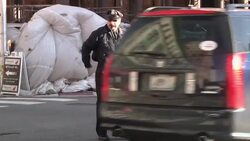 Police officer entertains the holiday crowds with his fancy footwork News Clip