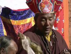WS Lama and local villagers gathered at tscheu tibetan buddhist religious  festival / Saldang village, High Himalayas, Upper Dolpo near Tibetan border, Nepal   Stock Footage