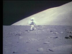 Astronaut running toward camera on Moon / Apollo 17 Stock Footage