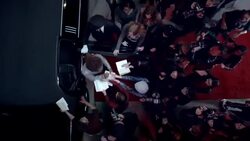 Chauffeur opens limousine door, hip-hop artist signs autographs for fans at awards show Stock Footage
