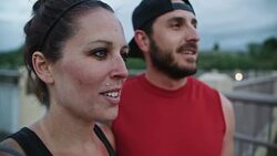 Physically Fit Caucasian Couple in their Thirties Talking Stock Footage