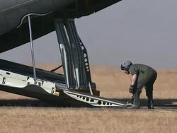 WS PAN Loadmaster dropping ramp on military C130 aircraft / Johannesburg, Gauteng, South Africa Stock Footage