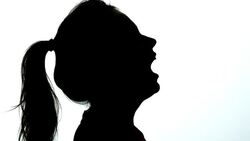 Silhouette of attractive woman sneezing Stock Footage