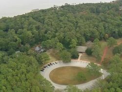 MS AERIAL Shot of Empty auditorium, fort raleigh and roanoke Gardens and car parking area / North Carolina, United States Stock Footage