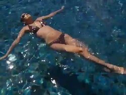 Woman in Pool (HD 1080) Stock Footage