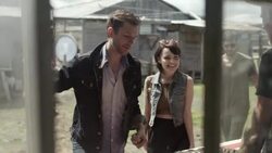 Group of friends approach Western shop and chat with store owner in Texas ghost town Stock Footage