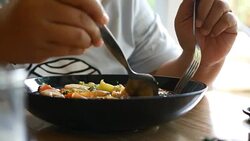 Noodles in a Creamy Sauce Stock Footage