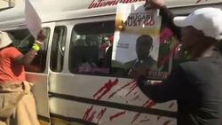 Zimabweans rally against Mugabe outside parliament Instructional Video