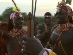 Maasai Ceremony - Young warriors dancing and singing, WITH AUDIO Stock Footage