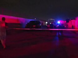 MS PAN Shot of Mexican CSI block off crime scene with tape AUDIO / Ciudad Juarez, Juarez, Mexico Stock Footage