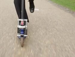 Business man rides a scooter Stock Footage