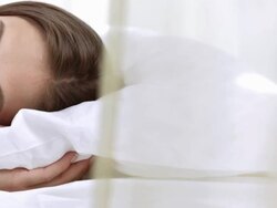 HD DOLLY: Woman Lying On A Soft Pillow Stock Footage