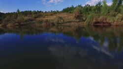 Man on the Mountain lake - Drone shot Stock Footage