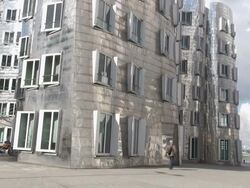 MS TU Shot of Frank O. Gehry buildings at Medienhafen, Rhine / Dusseldorf, North Rhine Westphalia, Germany Stock Footage