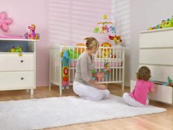 HD DOLLY: Mother and Daughter Putting Toys In Drawer Stock Footage