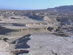 Aerial marlstone formations near Masada, Dead sea area, Judea Desert, Israel Stock Footage