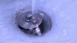Water flow into Sink Stock Footage