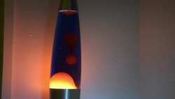 The Glowing Lava Lamps turning and calming the masses with its retro lava flow time-lapse Stock Footage