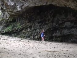 (HD1080i) Family Walking in Giant Cave, Zoom Out Stock Footage