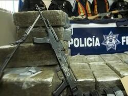 Secretary of State Hillary Rodham Clinton has visited a police station in Mexico's capital in a show of support for Mexico's struggle with powerful drug cartels. News Clip