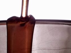 Syrup Hitting Rim Stock Footage