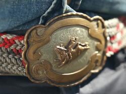A belt with a metal buckle on a cowboy Stock Footage