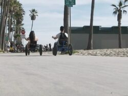 MS, LA, Lockdown, people inline skating and bicycling at the beach, Los Angeles, California, USA Stock Footage