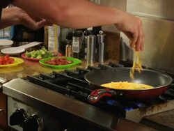 cooking eggs and veggies Stock Footage