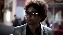 Hip-hop artist waits outside of limo at red carpet premiere at awards show Stock Footage