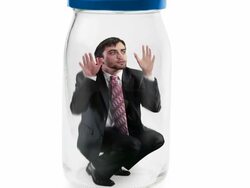 businessman trapped in jar Stock Footage