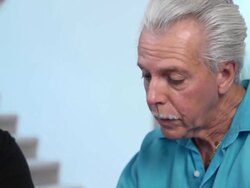 Latin Couple Work on Home Finances with Laptop- CU Stock Footage