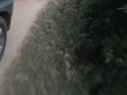 MS LA POV PAN driving on dirt road / Sam Nuea, Laos Stock Footage