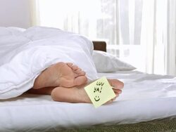 HD DOLLY: Woman's Feet With Loving Note Stock Footage