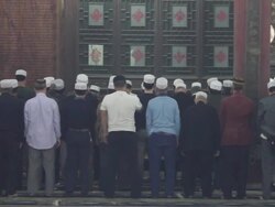 LS Muslim men praying in mosque/xian,shaanxi,China Stock Footage