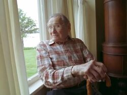 MS ZI ZO Senior man with cane looking out window / Washington State, USA Stock Footage