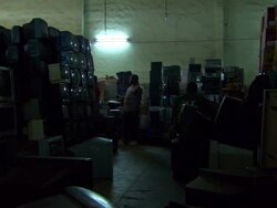 MS Shot of Impaired TV storeroom / Lagos, Nigeria Stock Footage