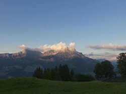 Time Lapse day to night pan ending on Mont Blanc Stock Footage