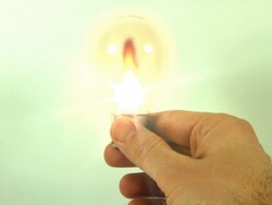 Flame in a Lightbulb. HD Stock Footage