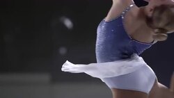 SLO MO TU Figure skater in a catchfoot layback spin Stock Footage