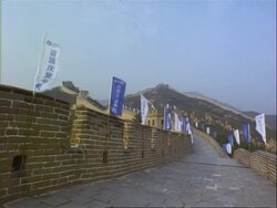 MWA Great Wall of China, people walk in to frame, Badaling, China Stock Footage