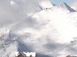 WS tilt up revealing summit of a ski resort with cabin / Golden, British Columbia, Canada Stock Footage