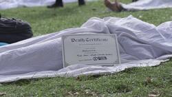 Extinction Rebellion activists pose as corpses on their second day of protests News Clip