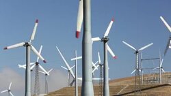 Part of the Tehachapi Pass wind farm, the first large scale wind farm area developed in the US, California, USA, at sunrise. Stock Footage