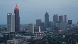 Elevated view over Interstate 85 passing the Downtown Atlanta skyline, Georgia, United States of America Stock Footage