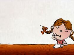 Little girl with bouncey pigtails writes a letter Stock Footage