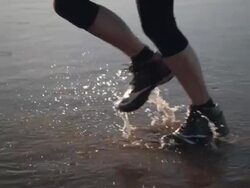 Jogging at the beach Stock Footage