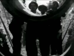 B/W 1934 men lowering piece of concrete pipe in WPA sewage construction project / documentary Stock Footage